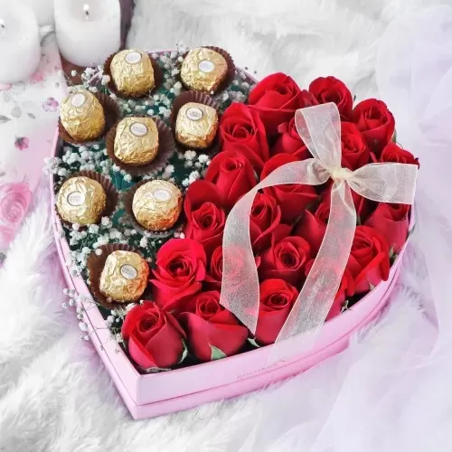 Gourmet Chocolates and Red Roses in Heart Shaped Gift Box Gourmet Chocolates and Red Roses in Heart Shaped Gift Box